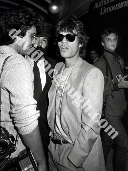 Mick Jagger with photographer David McGough.jpg